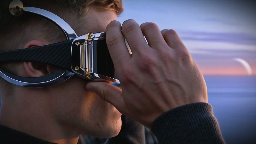 Man putting on Veyra eyewear against an otherworldly sky